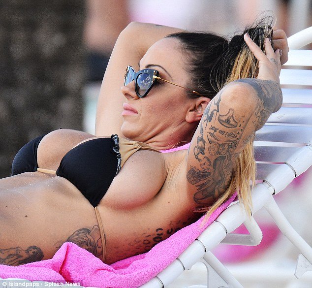 Jodie Marsh wears a super small bikini as she shows off her sideboob in Barbados
