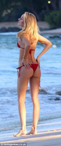 Kimberley Garner red bikini on the beach pic 6