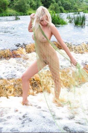 pretty blonde hot girl Berry naked in the river photo 1