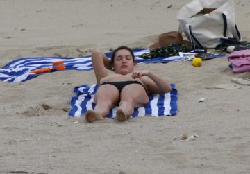 Kelly Brook topless on the beach