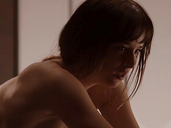 Dakota Johnson sensual in "Fifty Shades Of Grey"