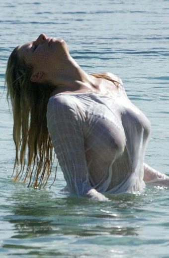 Abi titmuss wet and visible on the beach