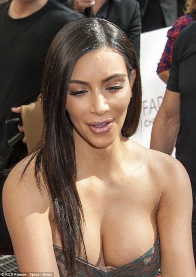 Kim Kardashian cleavage in strapless dress