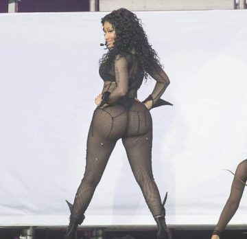 Nicki Minaj booty and busty display in net bodysuit thong