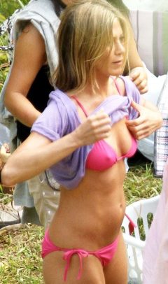 Jennifer Aniston poking nipples in pink bikini