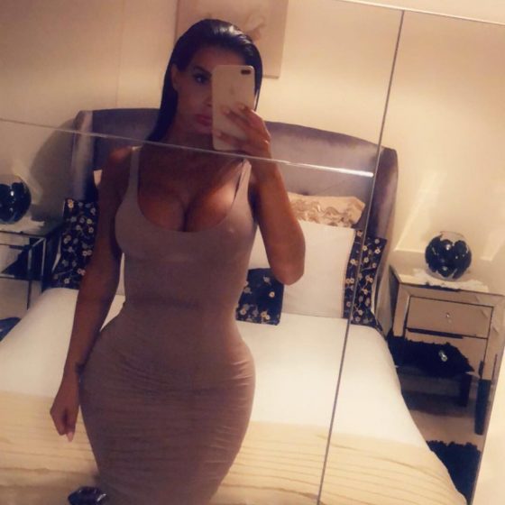 curvaceous woman tight dress selfie