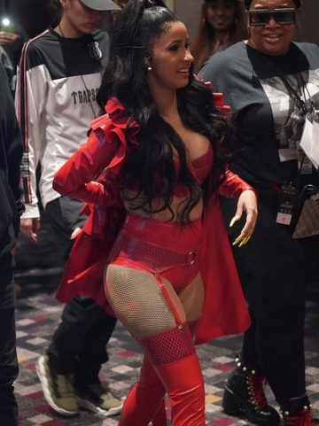 Cardi B sizzles in VERY racy PVC lingerie complete with suspenders and fishnets