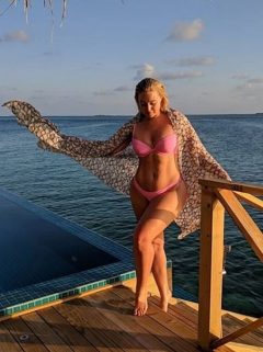 Iskra Lawrence showcases her sensational curves in a collection of tiny swimwear