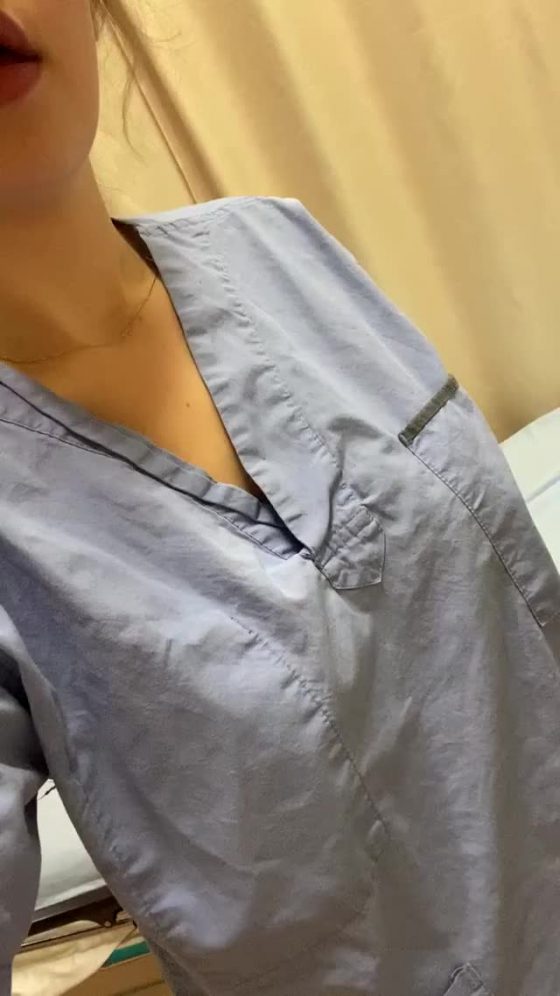 Bored at Work: Pretty nurse flashing her sexy tits! (gif)
