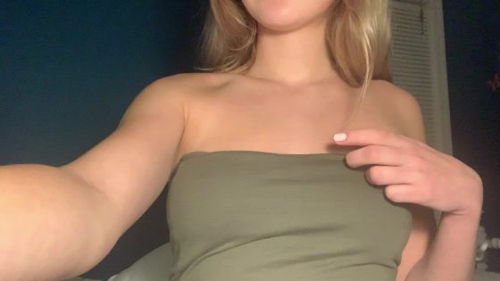 Young blonde chick shows us her pierced nipples (gif)