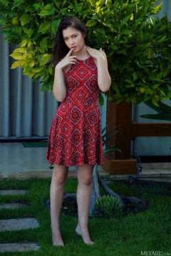 Gorgeous brunette in braless hot dress