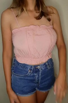 hot brunette girl braless top and jean shorts