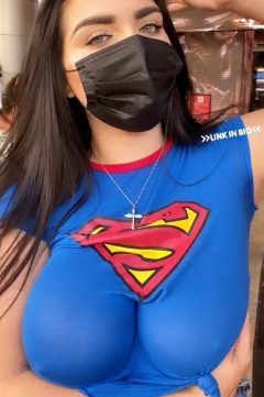 Braless superwoman with big boobs and a mask!