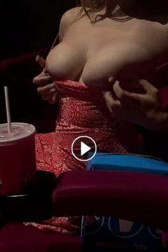 Juicy natural tits revealed by amateur girl in a cinema