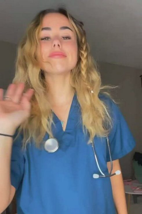 This busty nurse is determined to get you up! (gif)