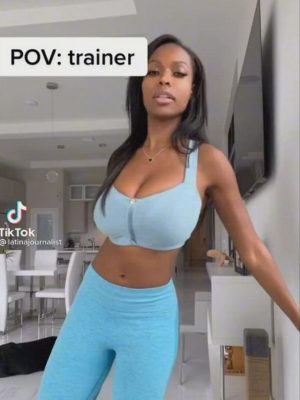 busty ebony woman with athletic outfit