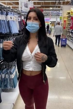 sexy young woman flashing tits in public