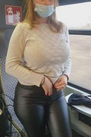 busty amateur woman on a train