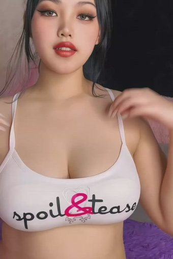 Cute Asian girl with big tiits in t-shirt