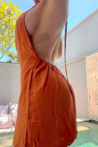 amateur busty woman sexy dress poolside strip