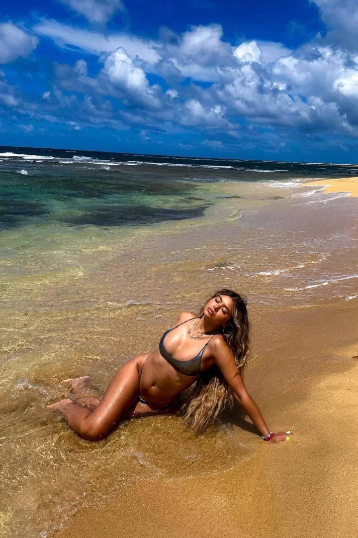 curvy model sexy pose on the beach