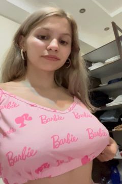 cute real girl with big boobs in braless top
