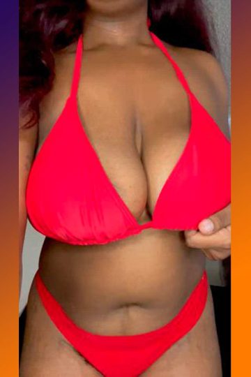 Busty ebony with bikini in breasts reveal (gif)