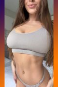 sexy fit babe with big tits in sports bra