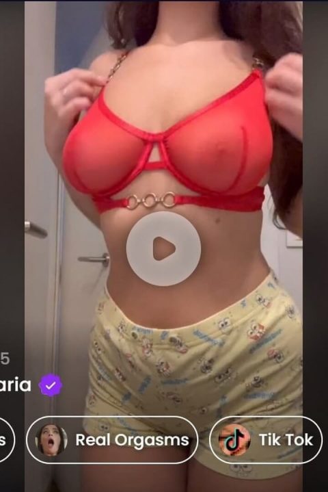 busty brunette with see-through red bra