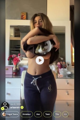 hot teen chick with lovely big tits getting topless