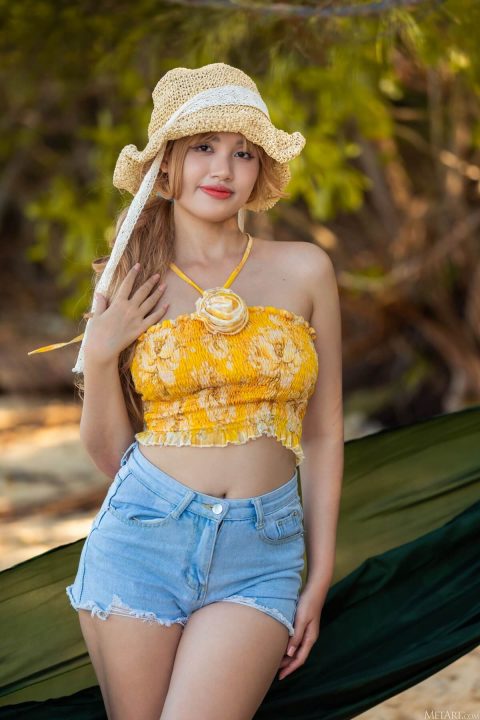 busty Asian girl sexy outfit with jean shorts