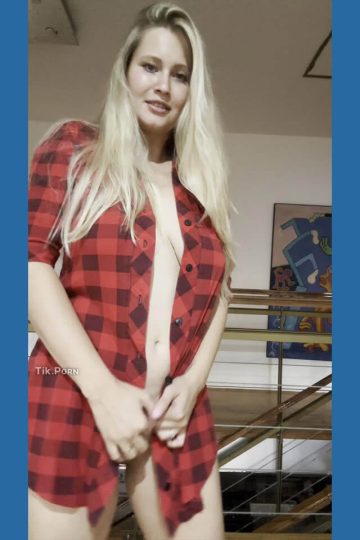 Erotic busty woman naked under flannel (gif)