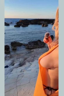 Revealing outfit for a hot busty blonde babe (short video)