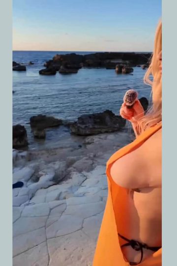 Revealing outfit for a hot busty blonde babe (short video)