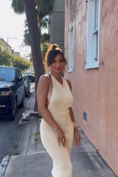 hot Female content creator with a sexy dress