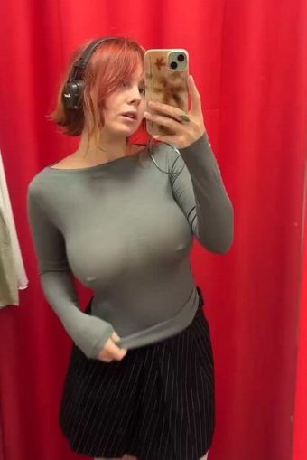 busty amateur in braless blouse in selfie