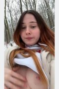 younger amateur babe flashing pierced tits in the snow