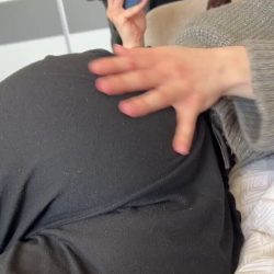 horny amateur girl ready to slip har pants to reveal her pussy on the bed