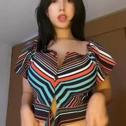 Beautiful amateur model from X performing a busty on/off bra reveal, showing naked natural curves in a high-quality NSFW bedroom setting.