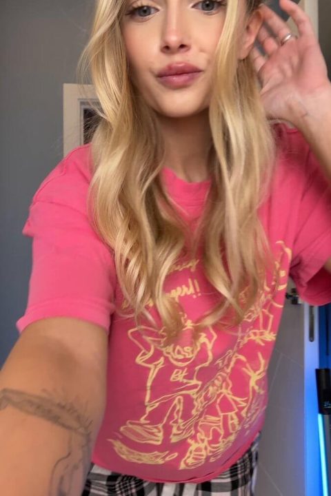 Pleasant amateur model on X transitioning from a cute outfit to fully nude, revealing huge natural breasts.