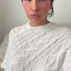 Pretty amateur girl with hot lips taking off a knitted blouse to reveal her yummy big tits and extraordinarily big nipples in a high-quality NSFW clip.