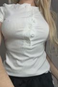 Busty faceless girl in a braless white shirt dropping the fabric to squeeze her big natural tits in a high-quality NSFW home reel.