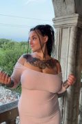 Chubby tattooed girl flashing large breasts - premium poster