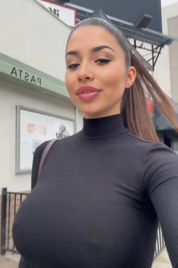 Busty Babe Walks Braless with Hard Nipples Poking Through Tight Black Top