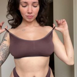 Tattooed brunette exposes hot natural boobs from bra - viral video poster