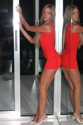stunning woman with hot body in mini red dress
