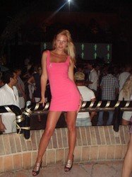 hot woman with slender body in mini tight dress