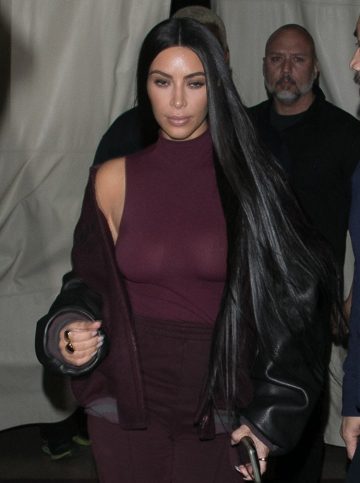 Kim Kardashian Sexy with See-through Purple Blouse (9 photos)