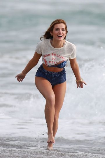 Bella Thorne in bikini at beach photoshoot in Malibu