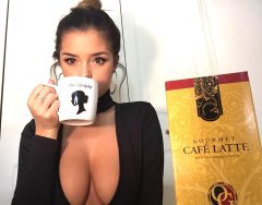 Busty Demi Rose with coffee mug and big cleavage